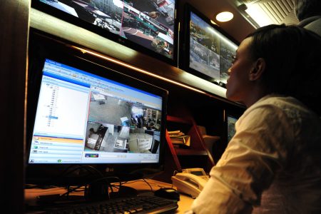 ASHKELON, ISR - JAN 18:CCTV security system operator on Jan 18 2009.Approx 25 million CCTV cameras are operating around the world.