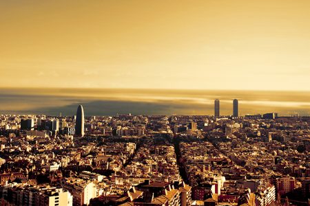 A bird view over city in sunset. Barcelona, Catalonia, Spain. Night, sunset